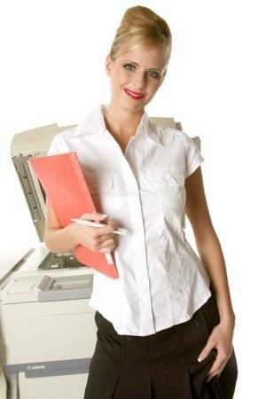 Sizzling hot busty secretary Zuzana works the copy machine in black stockings on adultfans.net