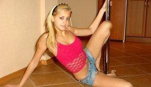 This blonde cover chick have a great wild posing on the floor on adultfans.net