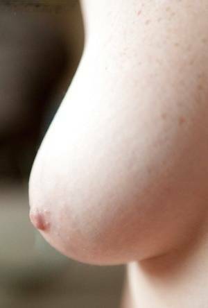 First time getting nude for amateur girl Laria and her big all natural tits on adultfans.net