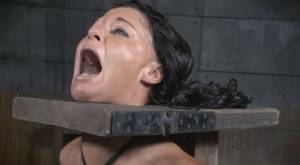 Restrained brunette London River is forced to suck a black penis on adultfans.net