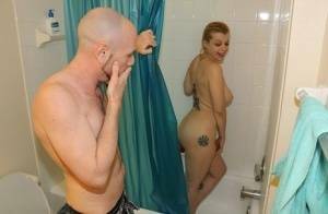 Naked girl Nadia White pleasures her guy's cock while taking a shower on adultfans.net