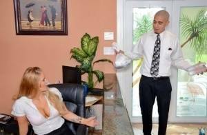 Clothed office worker unveiling big tits while fucking co-worker on adultfans.net
