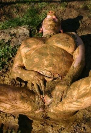 Thick amateur Mary Bitch drinks her own pee while playing in mud like a sow on adultfans.net