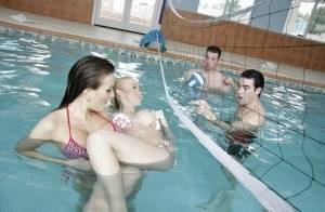 Full-bosomed water polo players enjoy a groupsex with their opponents on adultfans.net