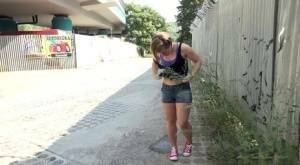 White girl pulls down her panties before squatting for a piss on country road on adultfans.net