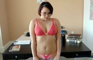 Enchanting coed in glasses Kaci Starr revealing puffy butt and tits on adultfans.net