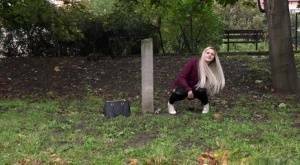 Dirty blonde female can't hold her pee any longer and pisses in public park on adultfans.net