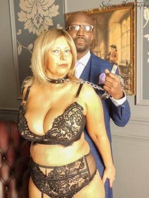 Overweight aged blonde Posh Sophia kneels afore her black owner while collared on adultfans.net