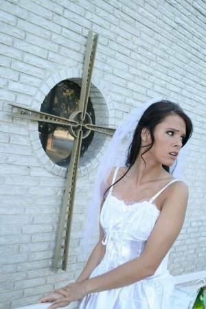 MILF babe in bride's dress Jennifer Dark spreading pussy on adultfans.net