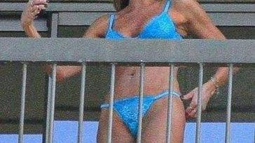Luciana Gimenez Relaxes in a Blue Bikini on the Balcony of Her Hotel in Rio de Janeiro on adultfans.net