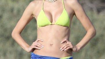 Alessandra Ambrosio Serves Up Beach Body in a Yellow Bikini While Out in Malibu on adultfans.net