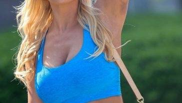 Busty Christine McGuinness Shows Off Extensive Bruising on Her Arms Looking Hot in a Blue Top on adultfans.net