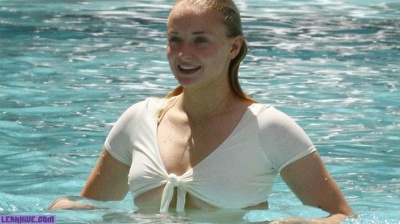 Sophie Turner caught in a bikini and wet flannel on adultfans.net