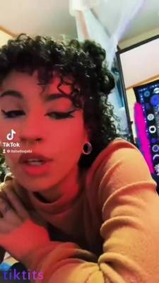 Curly girl flashes her nake ass in the mirror on Tiktok adult on adultfans.net