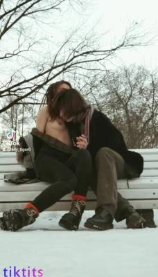 Two underage 18+ TikTok girls have fun in a snowy park and suck each other's virgin nipples nsfw on adultfans.net