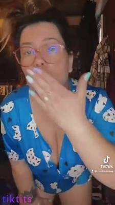 Mature fat woman shakes her tits and dances nude on Tik Tok on adultfans.net
