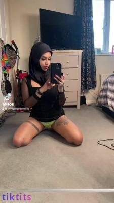 Naughty Muslim woman 18+ gets naked in front of the mirror and jumps on a fat dildo for tiktok porn on adultfans.net