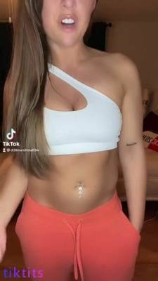 NSFW girl shoots trend tik tok clothes on clothes off with bare tits and smooth pussy on adultfans.net