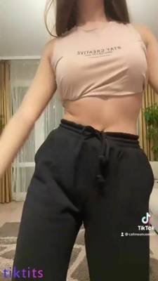 Girl with a beautiful figure elegantly twists her hips to TikTok tracks on adultfans.net
