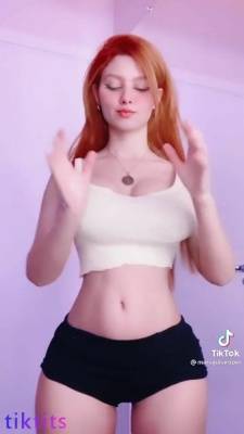 Busty redhead girl dancing on tic toc on adultfans.net