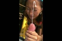 Tiny Asian gets covered in Cum on adultfans.net