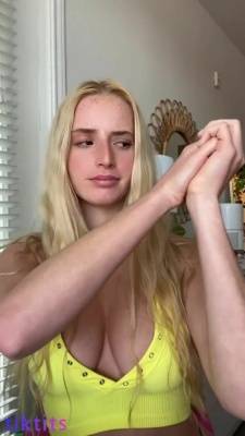 Freckled TikTok NSFW student shows off her pair of juicy boobs with a nice tan line on adultfans.net