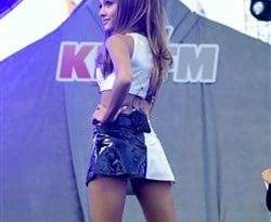 Ariana Grande Performs In A Leather Mini Skirt on adultfans.net