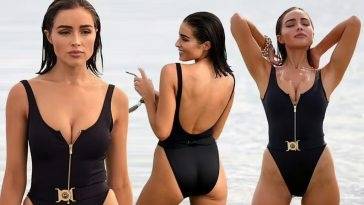 Olivia Culpo Looks Stunning in a Black Swimsuit on the Beach in Miami on adultfans.net