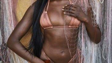 Duckie Thot Sexy 13 Sports Illustrated Swimsuit 2022 on adultfans.net