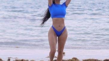 Kim Kardashian Shows Off Her Sensational Curves on the Beach on adultfans.net