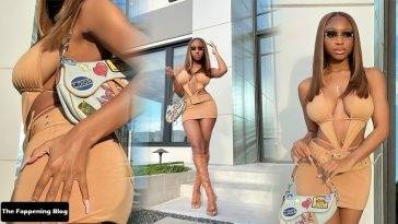 Normani Showcases Her Sexy Tits & Legs as She Poses in a Skimpy Dress on adultfans.net