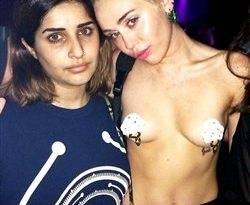 Miley Cyrus Topless With Pasties On At A Rave on adultfans.net