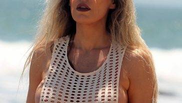 Ana Braga See Through Bikini On The Beach on adultfans.net