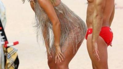 Rita Ora Looks Sensational as She Channels Baywatch in a Beautiful Dress on Sydney Beach on adultfans.net