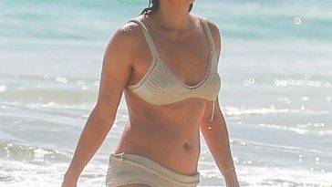 Michelle Rodriguez Has a Wardrobe Malfunction While on the Beach with a Mystery Woman on adultfans.net