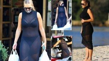 Rita Ora Looks Hot in a Sexy Black Sheer Dress in Sydney on adultfans.net