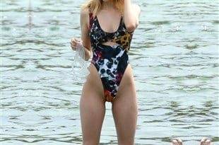 Nicola Peltz Thigh Gap And Pussy Stubble In A Thong Swimsuit on adultfans.net