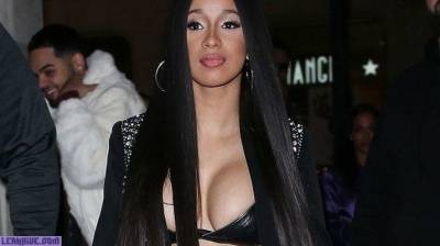 Cardi B showing off her beautiful cleavage on the streets of London on adultfans.net