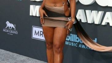 Megan Thee Stallion Flaunts Her Sexy Legs at the 2022 Billboard Music Awards on adultfans.net