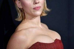 Scarlett Johansson With Her Boobs Pushed Up Fondling A Dildo on adultfans.net
