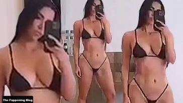 Kim Kardashian Shows Off Her Curves in a Micro Bikini (7 Pics + Video) on adultfans.net