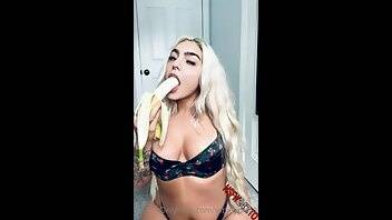 Emily Rinaudo striping teasing and sucking off banana in a black lingerie onlyfans porn videos on adultfans.net