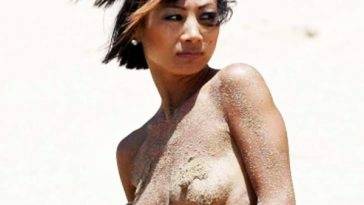 Actress Bai Ling Flashes her Nipples on the Beach in Hawaii on adultfans.net