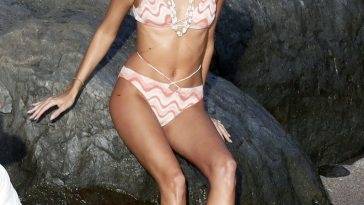Devon Windsor Flaunts Her Slender Figure in a Tiny Bikini on adultfans.net