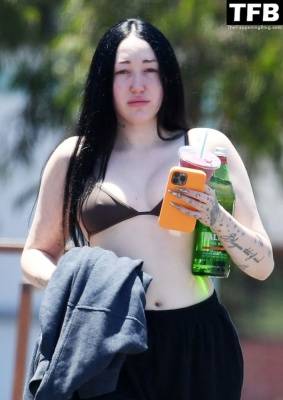 Noah Cyrus Slips Into a Bikini Top Cooling Off From the Sweltering Heat with Her Boyfriend in LA on adultfans.net