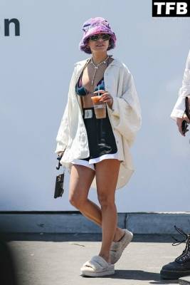 Vanessa Hudgens Grabs an Iced Coffee Wearing a Bikini Top on adultfans.net
