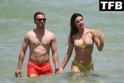 Arthur Melo Hits the Beach with His Girlfriend in Miami on adultfans.net