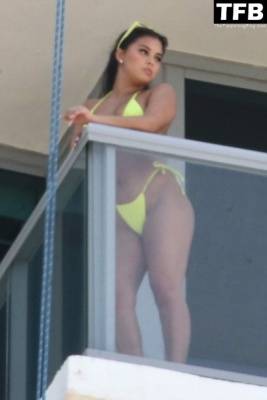 Aliana Mawla Puts on a Bikini Show on Her Hotel Balcony on adultfans.net