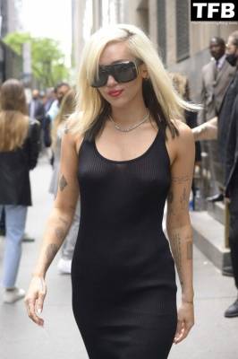 Miley Cyrus Flaunts Her Nude Tits as She Arrives at NBC Universal Upfronts in NYC on adultfans.net