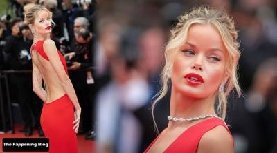 Frida Aasen Looks Stunning in a Red Dress at the 75th Annual Cannes Film Festival on adultfans.net